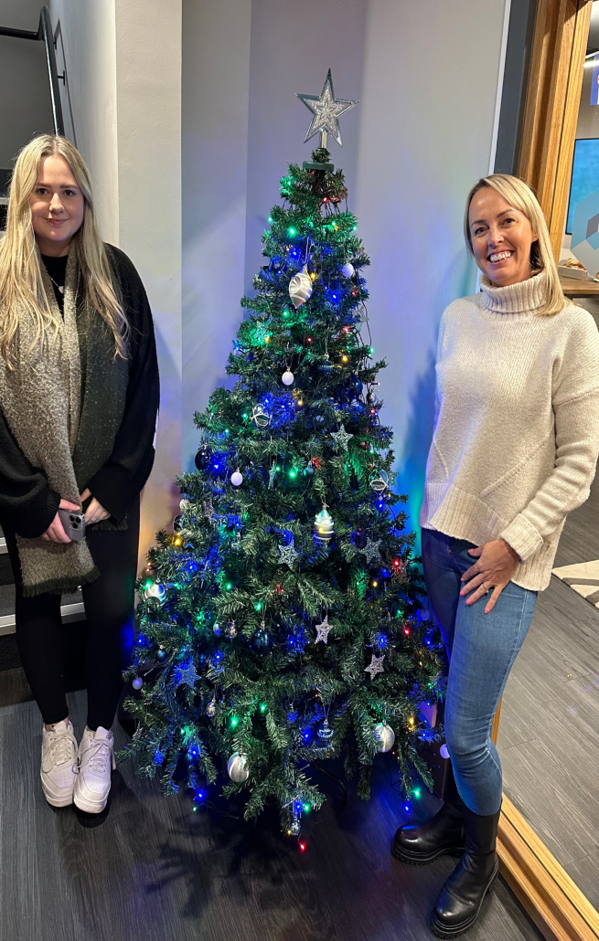 claire and jade with the valto Christmas tree